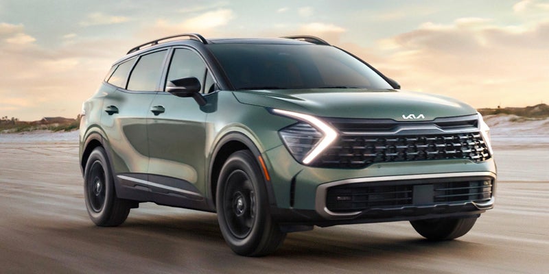 A 2024 Kia Sportage driving down a beach in New Port Richey, FL 