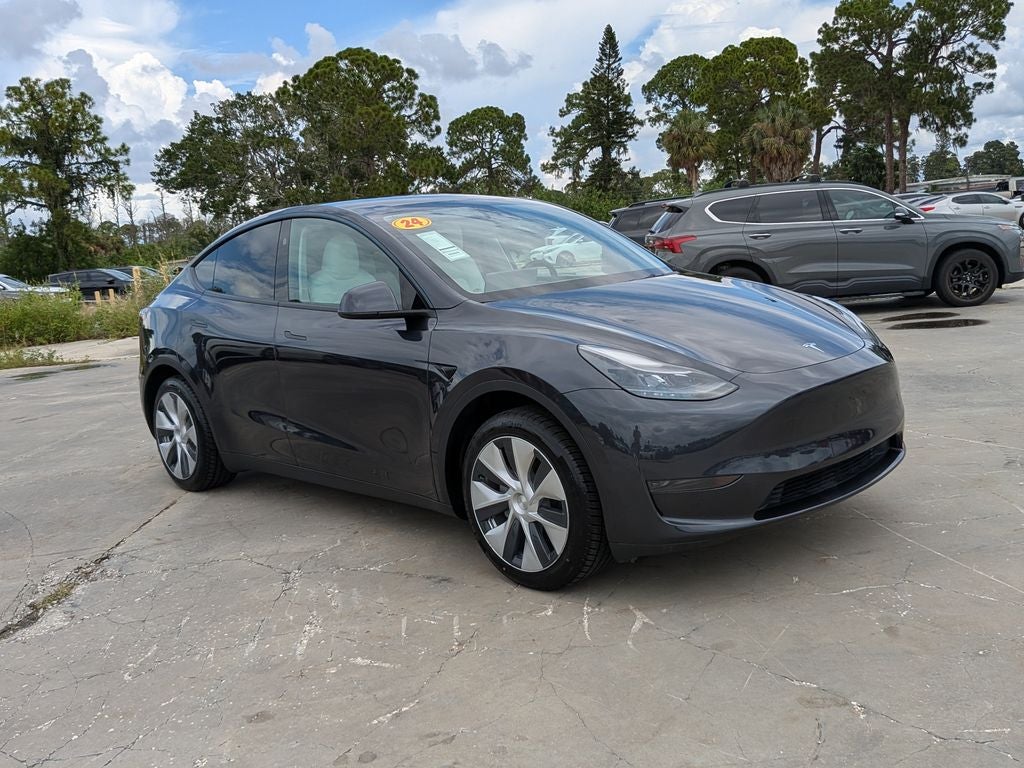 Used 2024 Tesla Model Y Long Range with VIN 7SAYGDED1RF024861 for sale in New Port Richey, FL