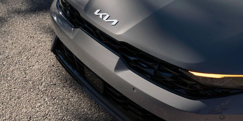 The front grille of the 2025 Kia K5 in New Port Richey, FL